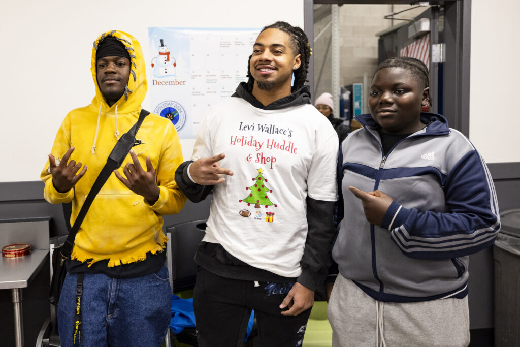 P.J. Locke during a holiday shopping event with the Levi Wallace Foundation at  in Aurora, Colorado on December 9, 2024. Photo by Ben Swanson / Denver Broncos