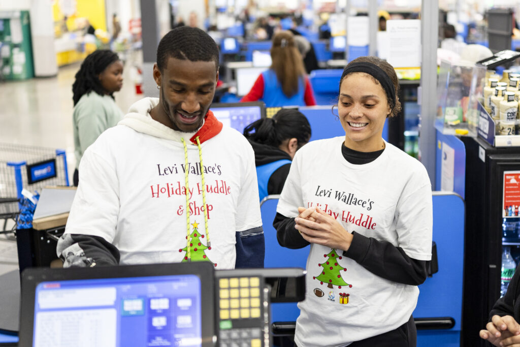 Levi Wallace during a holiday shopping event with the Levi Wallace Foundation at  in Aurora, Colorado on December 9, 2024. Photo by Ben Swanson / Denver Broncos