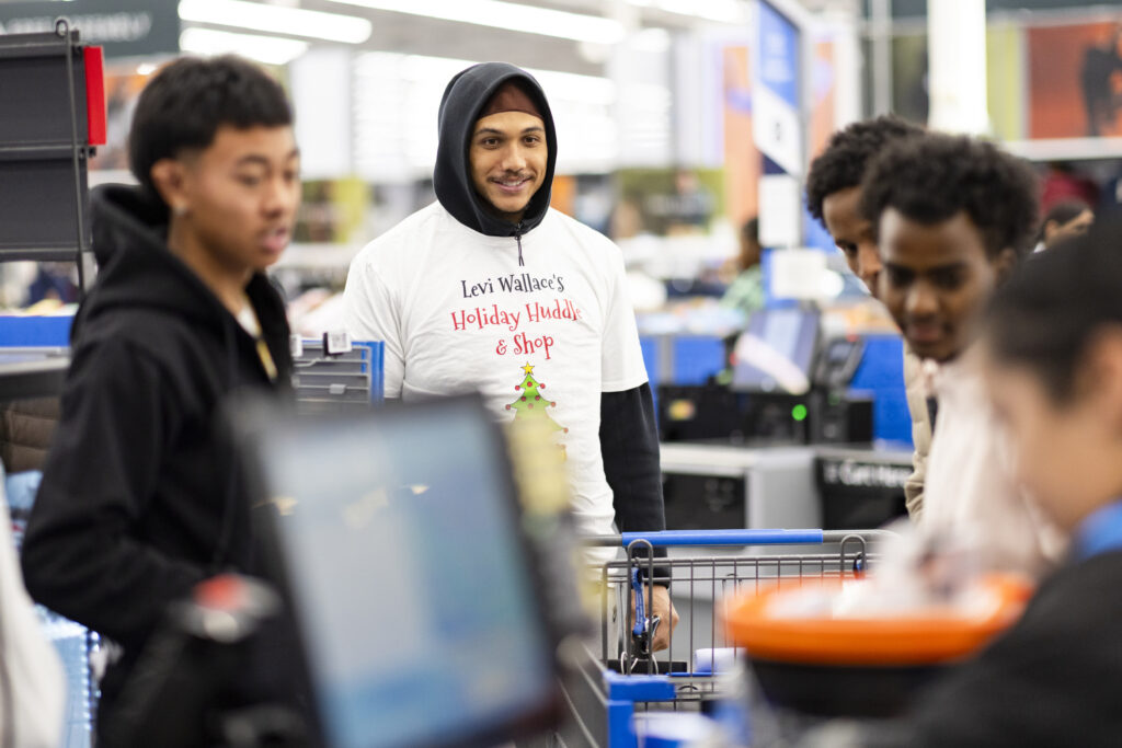 Devon Key during a holiday shopping event with the Levi Wallace Foundation at  in Aurora, Colorado on December 9, 2024. Photo by Ben Swanson / Denver Broncos