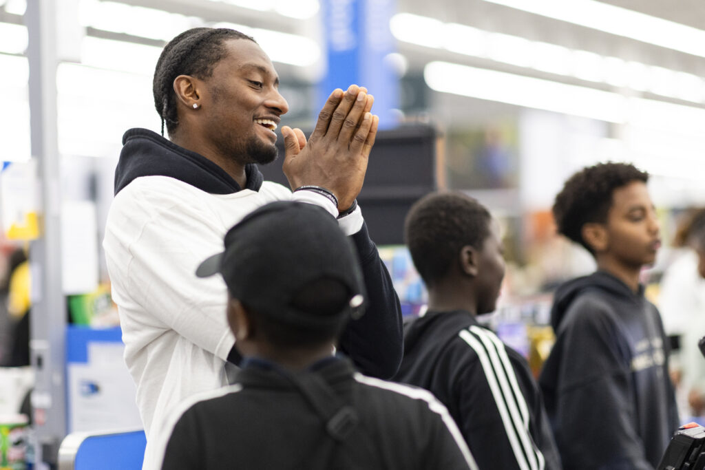 Keidron Smith during a holiday shopping event with the Levi Wallace Foundation at  in Aurora, Colorado on December 9, 2024. Photo by Ben Swanson / Denver Broncos